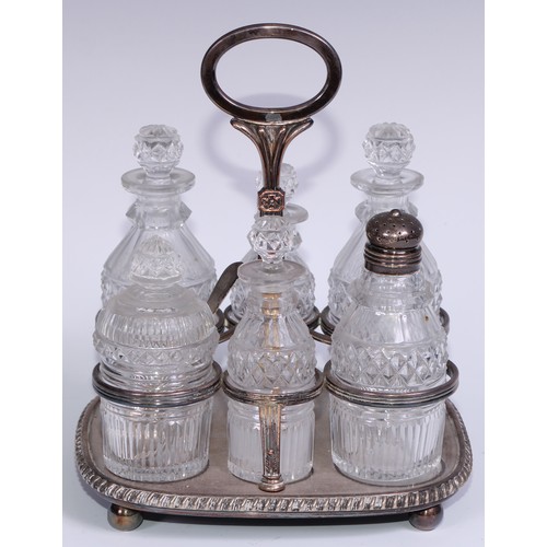 42 - Matthew Boulton - a Regency Old Sheffield Plate rounded rectangular six-bottle cruet, posted handle,... 