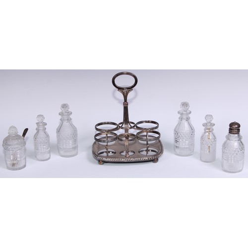 42 - Matthew Boulton - a Regency Old Sheffield Plate rounded rectangular six-bottle cruet, posted handle,... 