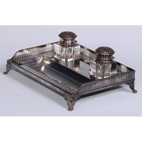 15 - A George III Old Sheffield Plate rectangular inkstand, pierced three-quarter gallery, square glass w... 