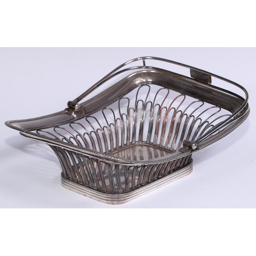 16 - A George III Old Sheffield Plate rope-twist wirework boat shaped cake basket, reeded borders and loo... 