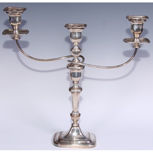 26 - A pair of George III Old Sheffield Plate three-light table candelabra, rectangular campana sconces, ... 