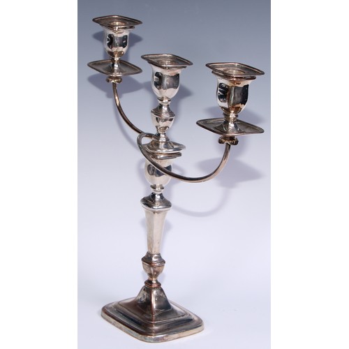 26 - A pair of George III Old Sheffield Plate three-light table candelabra, rectangular campana sconces, ... 