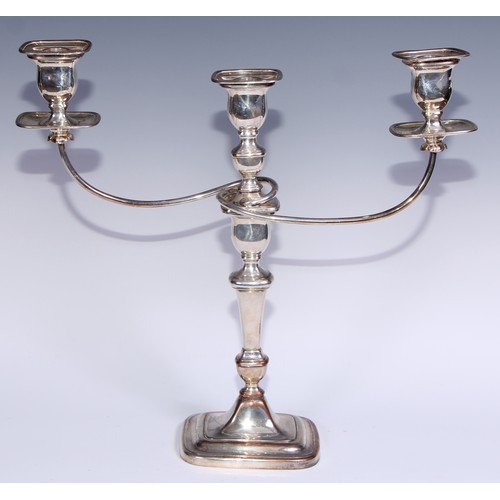 26 - A pair of George III Old Sheffield Plate three-light table candelabra, rectangular campana sconces, ... 