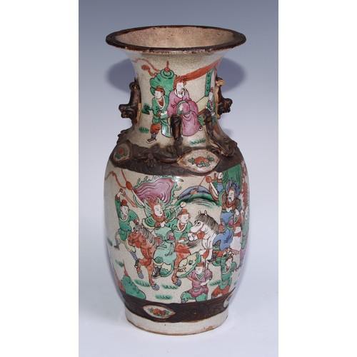 743 - A Chinese crackle glazed ovoid vase, painted in polychrome enamels with a battle scene, 35.5cm high,... 