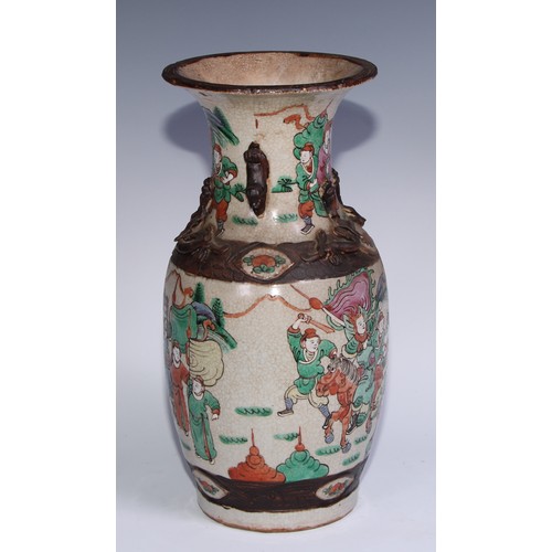 743 - A Chinese crackle glazed ovoid vase, painted in polychrome enamels with a battle scene, 35.5cm high,... 