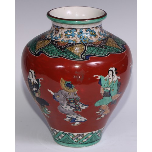 786 - A pair of Japanese ovoid vases, painted in polychrome with figures on a cinnabar ground, 26cm high, ... 