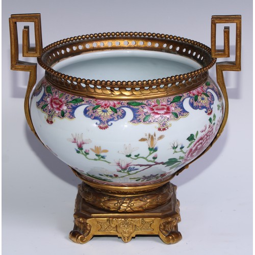 795 - An ormolu mounted Chinese ovoid jardiniere, painted in polychrome enamels in the famille rose palett... 