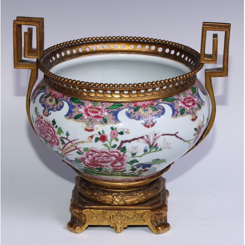 795 - An ormolu mounted Chinese ovoid jardiniere, painted in polychrome enamels in the famille rose palett... 