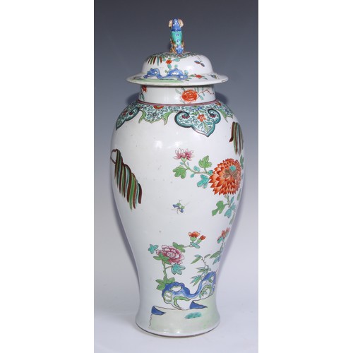 771 - A large 19th century baluster vase, painted in polychrome enamels and gilt with flowers, prunus, lot... 