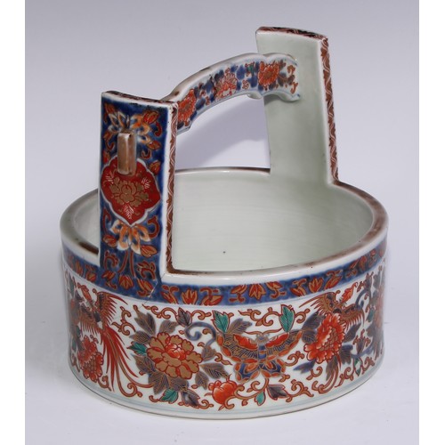 755 - A Japanese bowl, in the form of a rice bucket, painted in the Imari palette, 21cm wide, Meiji period