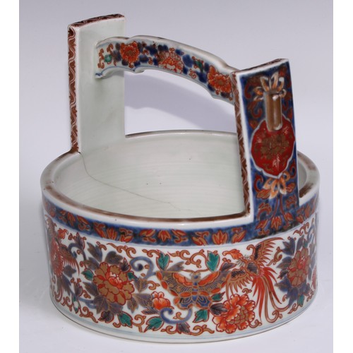 755 - A Japanese bowl, in the form of a rice bucket, painted in the Imari palette, 21cm wide, Meiji period