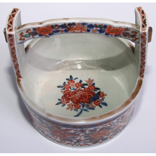 755 - A Japanese bowl, in the form of a rice bucket, painted in the Imari palette, 21cm wide, Meiji period