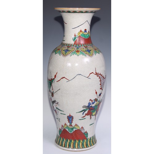 772 - A large Chinese crackle glaze ovoid vase, painted in polychrome with a battle scene, lappet border t... 