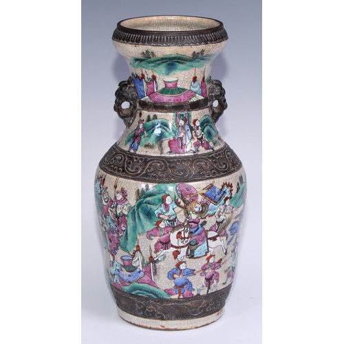 779 - A pair of Chinese crackle glazed ovoid vases, decorated in polychrome enamels with battle scenes, mo... 