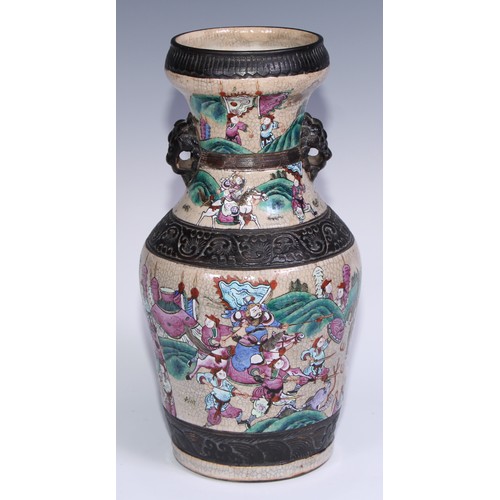 779 - A pair of Chinese crackle glazed ovoid vases, decorated in polychrome enamels with battle scenes, mo... 