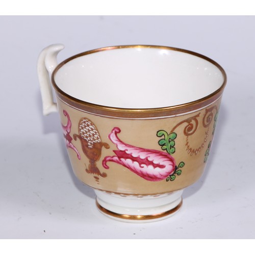 466 - A Swansea trio, comprising tea cup, coffee cup and stand, decorated in the Regency taste with buff t... 