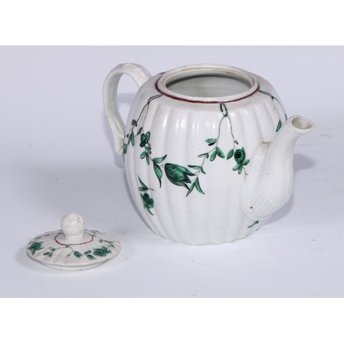 457 - A Bristol fluted barrel shaped teapot, painted in green with swags, 13cm high, blue B mark, c.1775