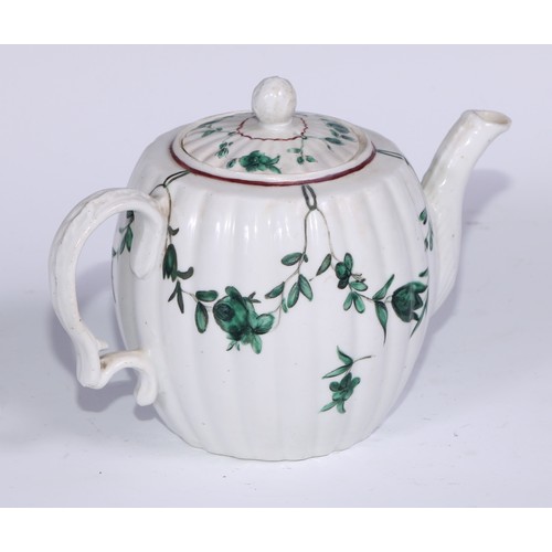 457 - A Bristol fluted barrel shaped teapot, painted in green with swags, 13cm high, blue B mark, c.1775