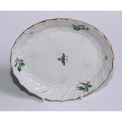 402 - A Barr Flight & Barr Worcester shaped oval teapot stand, painted in tones of green and gilt with an ... 