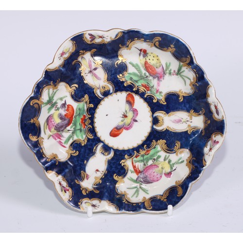 435 - A Worcester fluted shaped circular teapot stand, painted in polychrome with birds and insects, withi... 