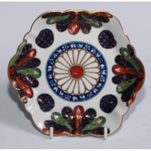 435 - A Worcester fluted shaped circular teapot stand, painted in polychrome with birds and insects, withi... 