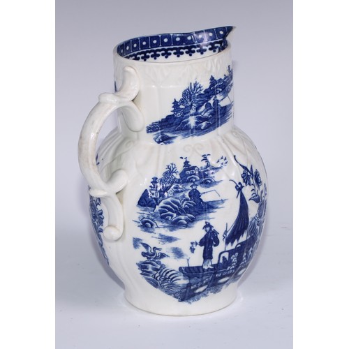 405 - A Caughley Fisherman and Cormorant pattern cabbage leaf moulded jug, mask spout, 22cm high, c.1785