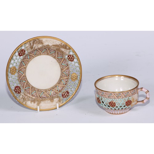 428 - A Royal Worcester reticulated cup and saucer, in the manner of George Owen, decorated in the Japanes... 