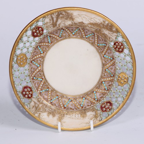 428 - A Royal Worcester reticulated cup and saucer, in the manner of George Owen, decorated in the Japanes... 