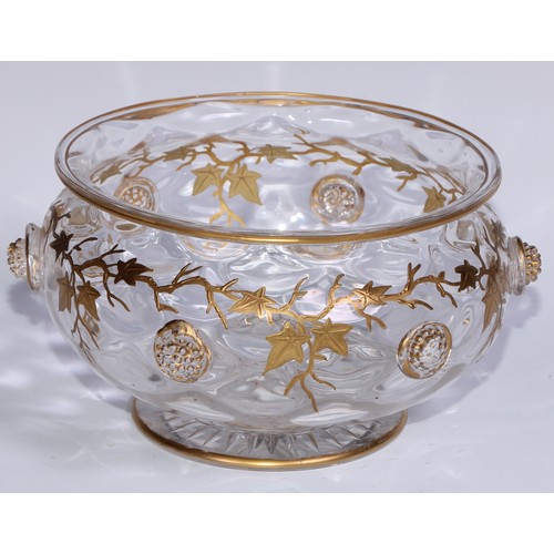 539 - A Continental Art Nouveau glass bowl, decorated in gilt with trailing vine terminating in applied gr... 