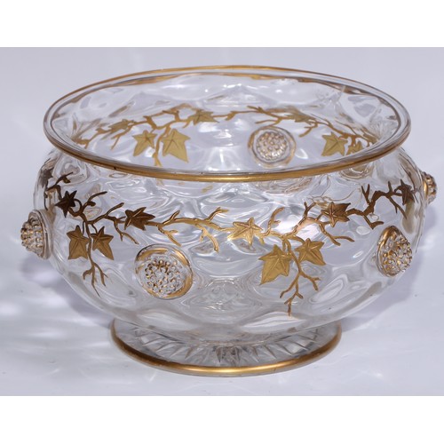 539 - A Continental Art Nouveau glass bowl, decorated in gilt with trailing vine terminating in applied gr... 