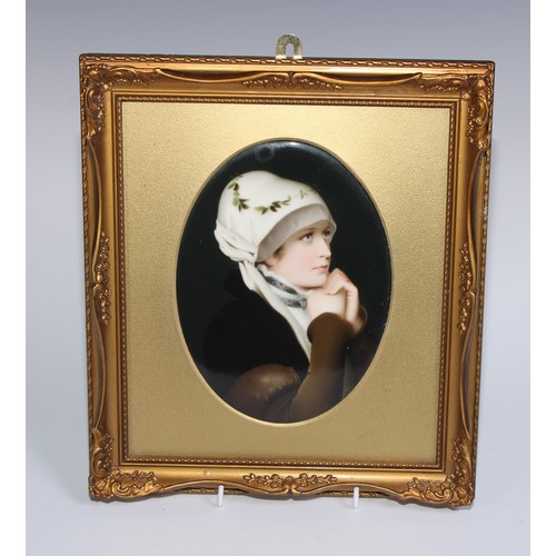 518 - A German porcelain oval plaque, painted with a portrait of a lady, 18.5cm x 14cm, gilt frame, 29cm x... 