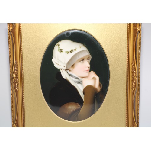 518 - A German porcelain oval plaque, painted with a portrait of a lady, 18.5cm x 14cm, gilt frame, 29cm x... 