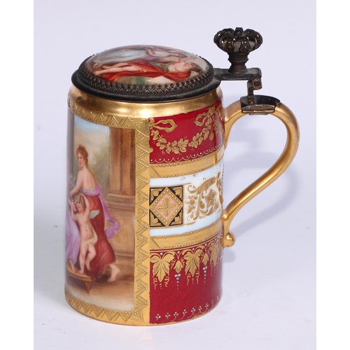 536 - A Vienna porcelain tankard, painted with Venus at her toilet, gilded and jewelled with fruiting vine... 