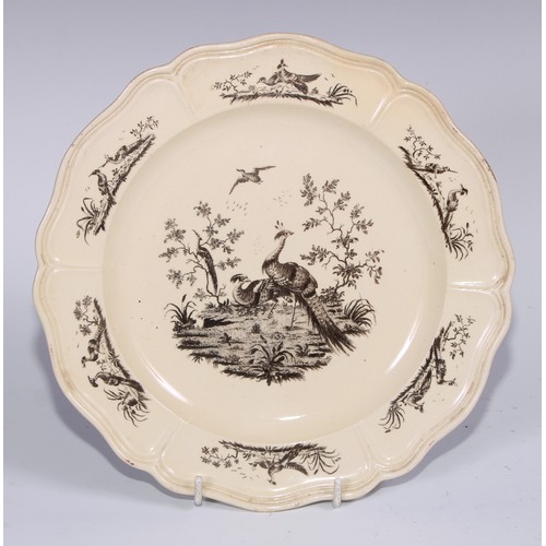 453 - A Wedgwood creamware shaped circular plate, Liverpool printed with birds, 24cm diam, c. 1780; a sauc... 