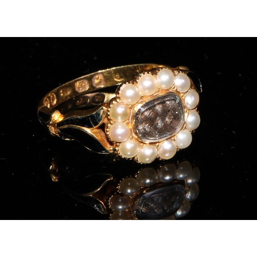 359 - A Victorian 18ct gold mourning ring, set with a plaited and waxed lock of hair, surrounded by twelve... 