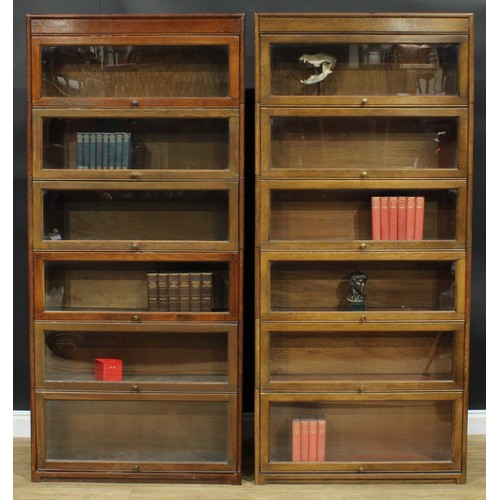 1367 - A near pair of mid-20th century government austerity regulation approved barrister's bookcases, each... 