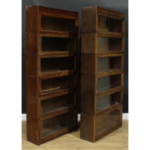 1367 - A near pair of mid-20th century government austerity regulation approved barrister's bookcases, each... 