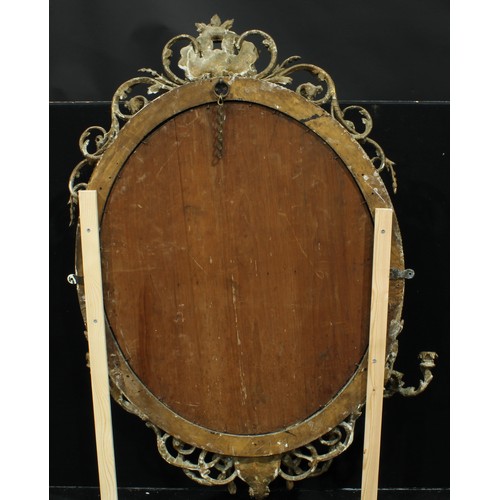 957 - A 19th century giltwood and gesso girandole chimney glass, plain mirror plate, the frame applied wit... 