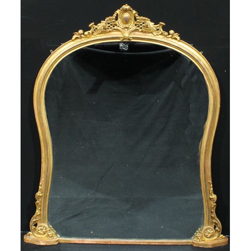 1308 - A 19th century giltwood overmantel chimney glass, plain mirror plate, the cresting applied with scro... 