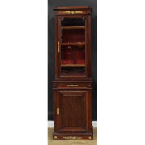 1372 - A pair of 19th century French Empire design gilt metal mounted mahogany pier bookcases, each with an... 