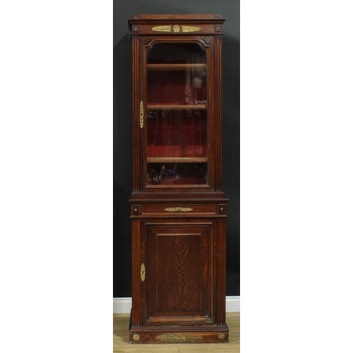 1372 - A pair of 19th century French Empire design gilt metal mounted mahogany pier bookcases, each with an... 