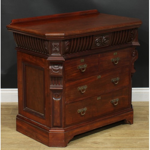 1335 - A late Victorian mahogany chest, oversailing top with canted foreangles and shallow half-gallery abo... 