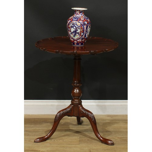 937 - A 19th century mahogany tripod occasional table, dished pie-crust tilting top, turned column, cabrio... 