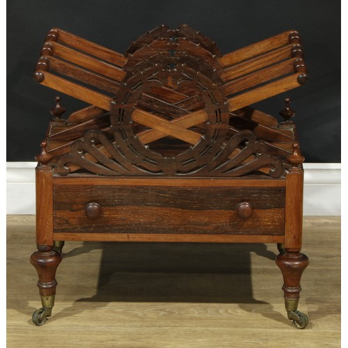 1418 - A Post-Regency rosewood three-section Canterbury, X-frame divisions applied with stylised laurel wre... 