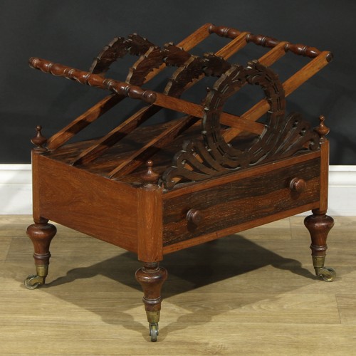 1418 - A Post-Regency rosewood three-section Canterbury, X-frame divisions applied with stylised laurel wre... 