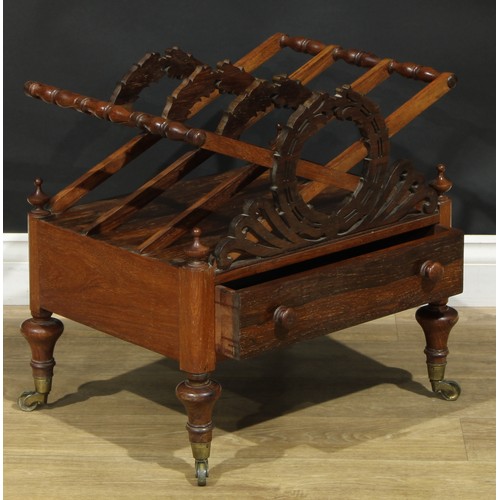 1418 - A Post-Regency rosewood three-section Canterbury, X-frame divisions applied with stylised laurel wre... 