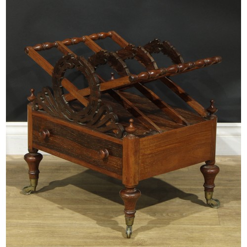 1418 - A Post-Regency rosewood three-section Canterbury, X-frame divisions applied with stylised laurel wre... 