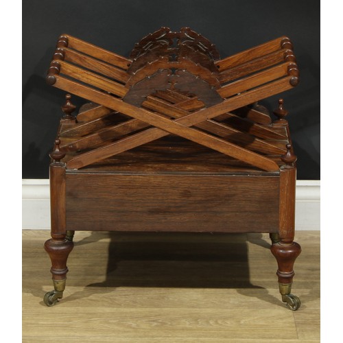 1418 - A Post-Regency rosewood three-section Canterbury, X-frame divisions applied with stylised laurel wre... 