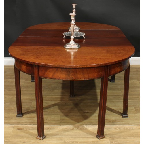 1217 - A George III mahogany D-end dining table, two additional leaves, moulded square legs, 71cm high, 119... 