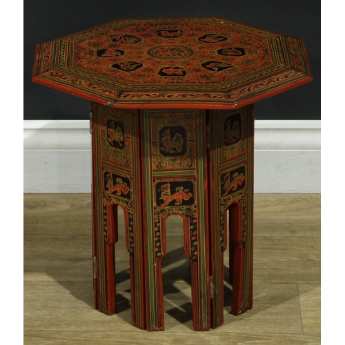 1365 - A near pair of Burmese red lacquer Hoshiarpur tables, decorated throughout in the traditional manner... 